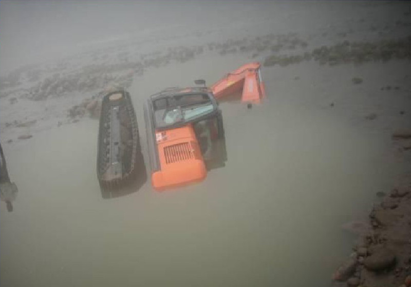excavator built in the river sand of the river